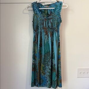 Unity turquoise A-line midi dress w/a peacock floral print & smocked bodice